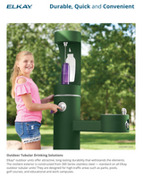 Elkay outdoor drinking fountain with a child using it, surrounded by greenery.